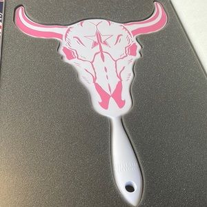 White and pink Star Ranch skull mirror